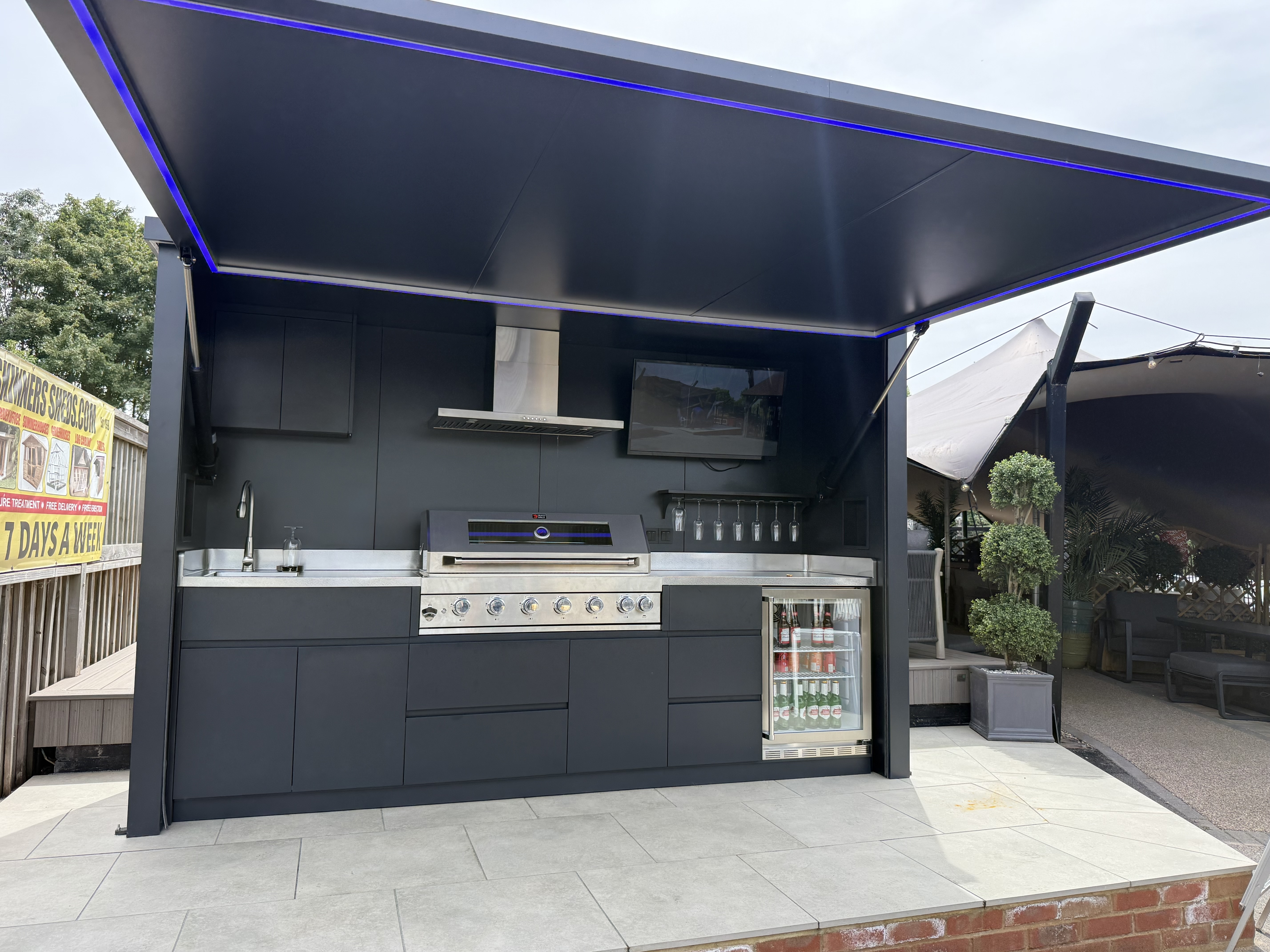 Close-up of premium outdoor kitchen with blue LED lighting